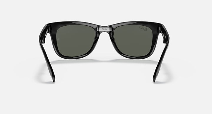Folding Wayfarer sunglasses front view with black frame and dark green lenses