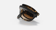 Ray-Ban Folding Wayfarer sunglasses shown folded with brown tinted lenses