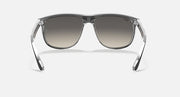 Ray-Ban sunglasses with translucent light grey frame and dark smoke lenses, front view