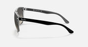 Ray-Ban sunglasses with black full-rim frame and dark lenses, side view