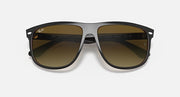 Sunglasses front view with light-to-dark brown frame and amber gradient lenses.
