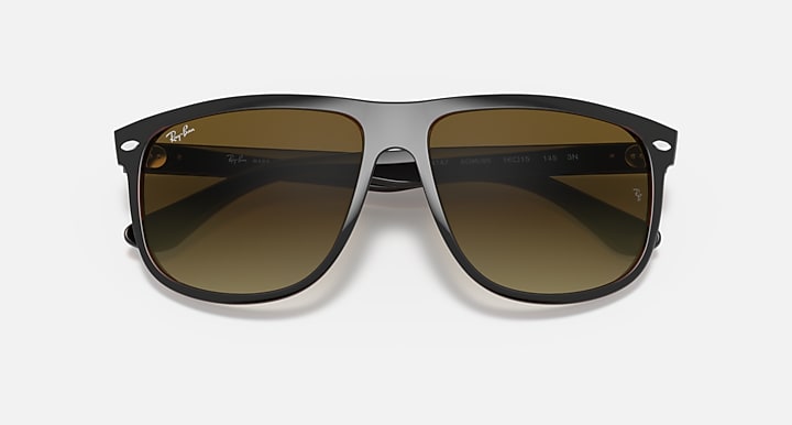 Sunglasses front view with light-to-dark brown frame and amber gradient lenses.