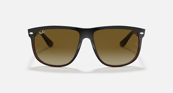 Sunglasses with dark brown frame and gradient amber lenses, glossy black top.