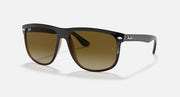 Sunglasses with dark brown frame and gradient amber lenses, black temple tips.