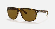 Ray-Ban sunglasses with tortoise-pattern frame and amber-brown lenses, side view