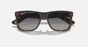 Tortoise-frame square sunglasses with dark gray lenses, angled top view