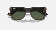 Tortoise-frame square sunglasses with dark green lenses, angled front view
