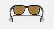Black rectangular sunglasses with amber lenses and curved temple arms
