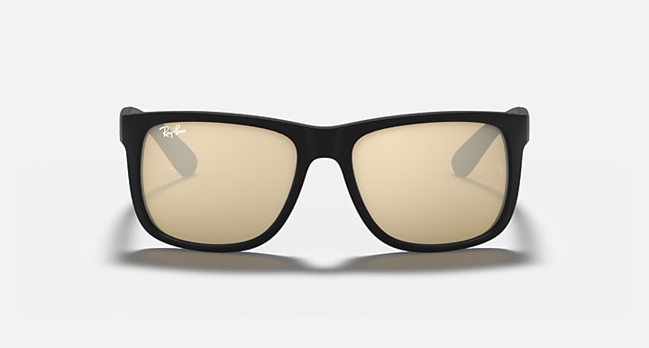 Ray-Ban sunglasses with black frame and tan tinted lenses