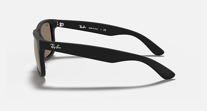 Ray-Ban sunglasses with black frame and brown-tinted lenses (side view)