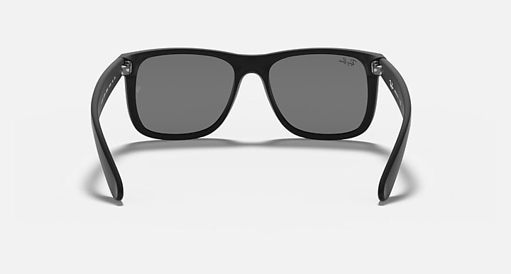 Ray-Ban Justin sunglasses with black frame and dark gray lenses, straight-on view.