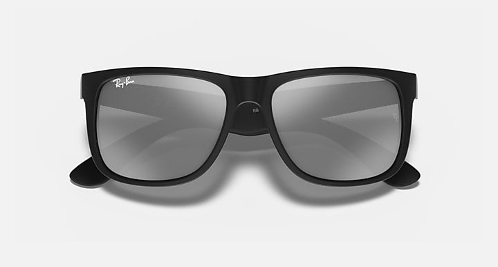 Ray-Ban Justin sunglasses with black frame and dark gray gradient lenses.