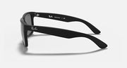 Ray-Ban Justin sunglasses, side profile with black frame and dark gray lenses.