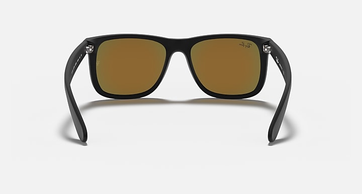 Black rectangular sunglasses with brown lenses and curved temple arms