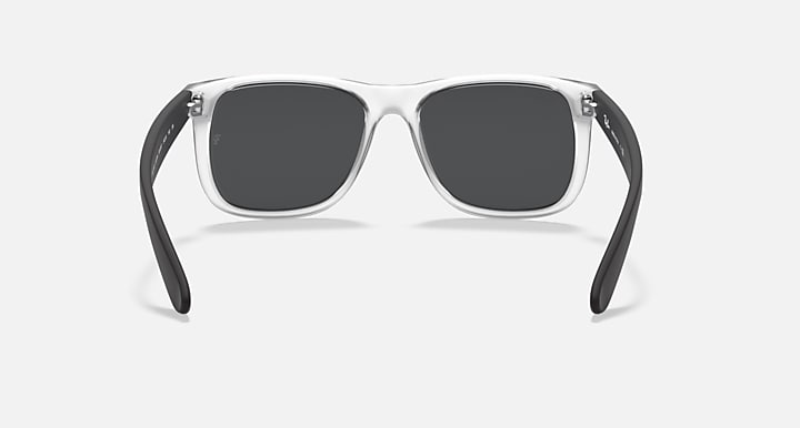 Ray-Ban Justin sunglasses with clear/light frame and dark gray lenses.