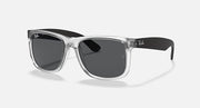 Ray-Ban Justin sunglasses with clear/silver frame and dark gray lenses.