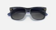 Navy blue sunglasses with dark lenses and oversized square frames