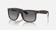 Tortoiseshell sunglasses with dark square lenses and thick acetate frame