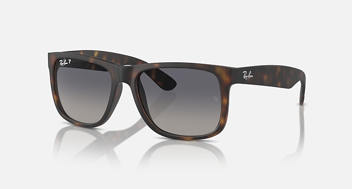 Tortoiseshell sunglasses with dark square lenses and thick acetate frame