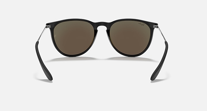 Sunglasses with dark brown lenses and matte black frame, front view