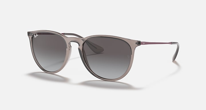 Sunglasses with taupe frame and dark gradient lenses, rounded square shape