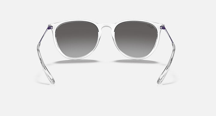 Sunglasses with clear frame and dark gradient lenses, purple temple accents