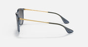 Blue-gray sunglasses with gold-tone metal temples and dark gradient lenses