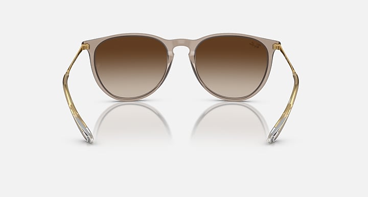 Brown gradient sunglasses with gold metal frame, angled front view