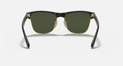 Oversized black browline sunglasses with green lenses, gold-tone bridge and hinges