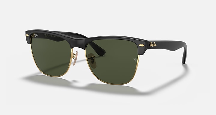 Oversized black browline sunglasses with green lenses and gold-tone accents, large fit