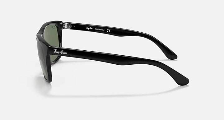 Ray-Ban sunglasses, black frame with dark green lenses, side profile