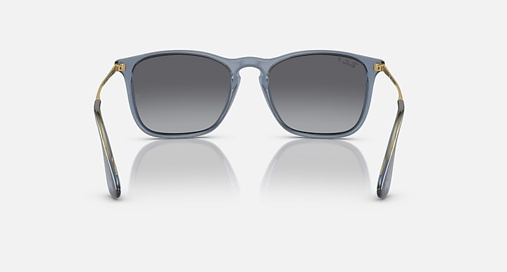 Ray-Ban sunglasses front view with blue-gray frame, dark lenses, and gold temple tips