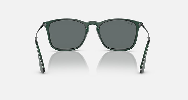 Square sunglasses with gray-green lenses and dark green frame with clear temple accents