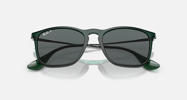 Front view sunglasses with dark lenses, dark green frame, and gold-tone bridge hardware