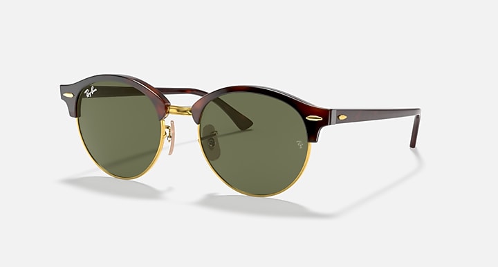 Round sunglasses with dark green lenses, tortoise brown frame and gold-tone accents