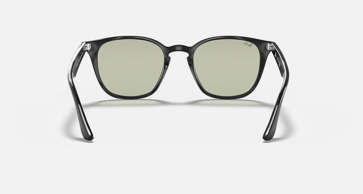 Ray-Ban RB4258F sunglasses with silver-toned frame and green lenses, front view