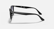 Black sunglasses, side profile with slim arms and dark tinted lenses
