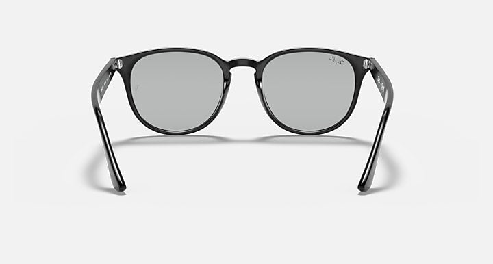 Black oversized round sunglasses with large frames and gray-tinted lenses, front view