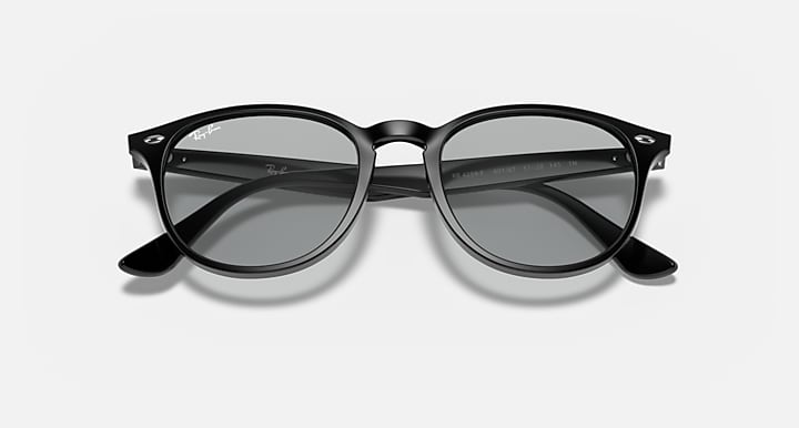 Black oversized round sunglasses with dark lenses and curved side arms
