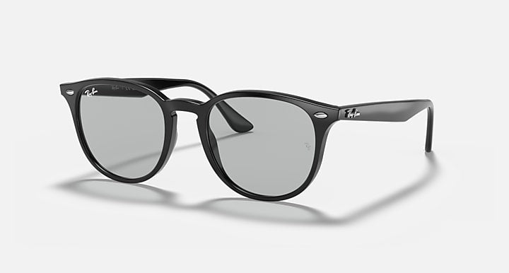 Black oversized round sunglasses with large lenses and smoky gray tint