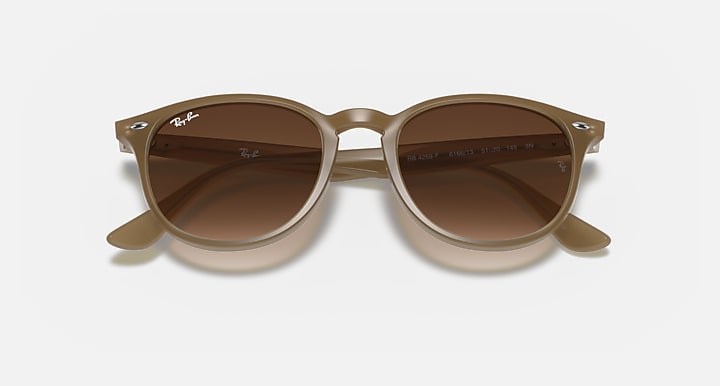 Light havana sunglasses with brown tinted lenses and subtle temple details