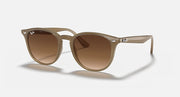 Light havana sunglasses with large round lenses, brown gradient tint