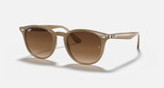 Ray-Ban RB4259 round sunglasses with light havana frame and brown tinted lenses