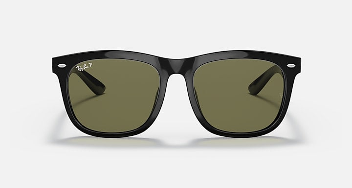 Black rectangular sunglasses with green-tinted lenses, front studs detail