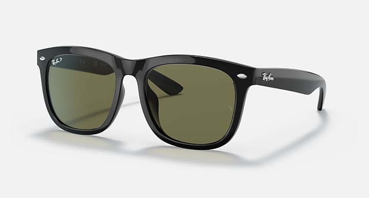 Black square sunglasses with olive-tinted lenses and glossy temples