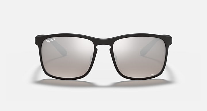 Black square sunglasses with reflective mirrored lenses and Ray-Ban logo