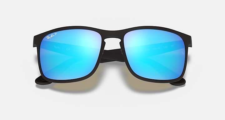 Black square sunglasses with bright blue mirrored lenses and Ray-Ban logo