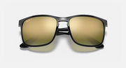 Sunglasses with black frame and gold mirrored rectangular lenses