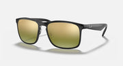 Black square sunglasses with gold mirrored lenses and Ray-Ban logo at temple