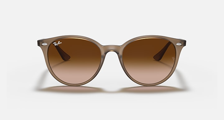 Ray-Ban RB4305 round sunglasses with light havana frames and brown-tinted lenses